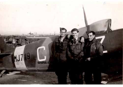 Pilot Tom Daniel with his ground crew in Salonika, Greece